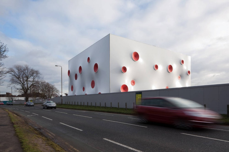Illustration for article titled Technicolor Bullet Holes Make This the Perfect Home for Olympic Shooting